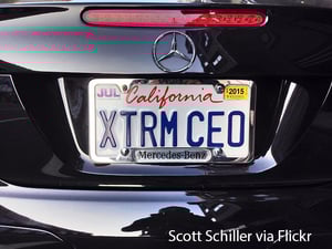 CEO driving a Mercedes-Benz