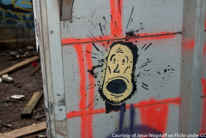 A spray painted surprised face